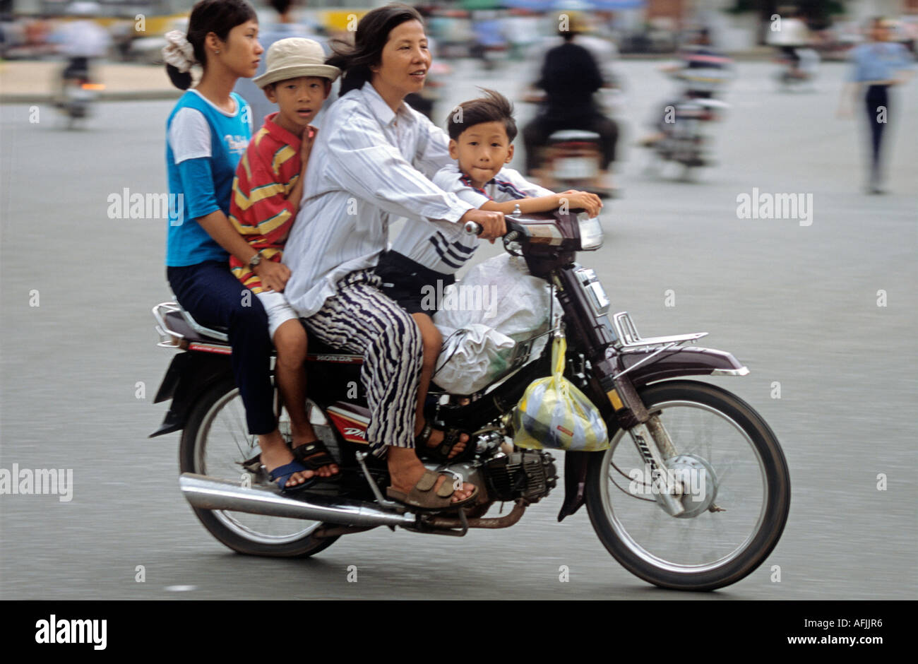 motorcycle family photo
 Four Family On Scooter Motorcycle Stock Photos 